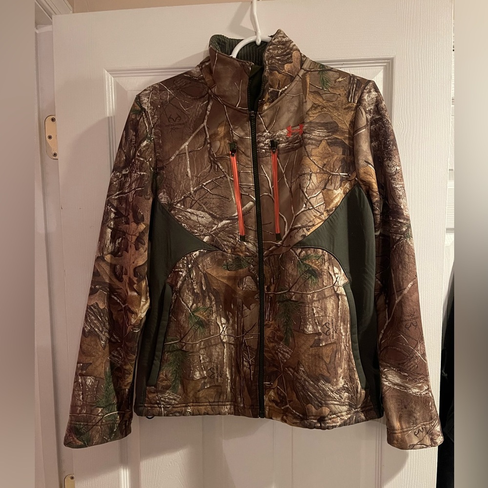 Under armour women’s camo cold gear jacket.